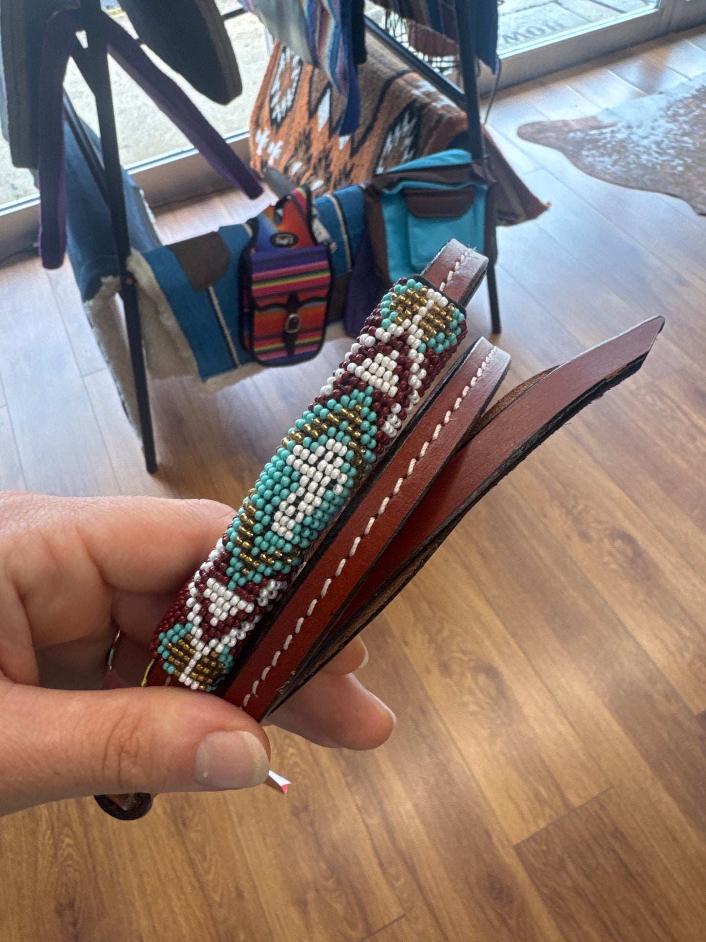 4ft Leather over & under whip with teal, red, and gold cross designed beaded overlay